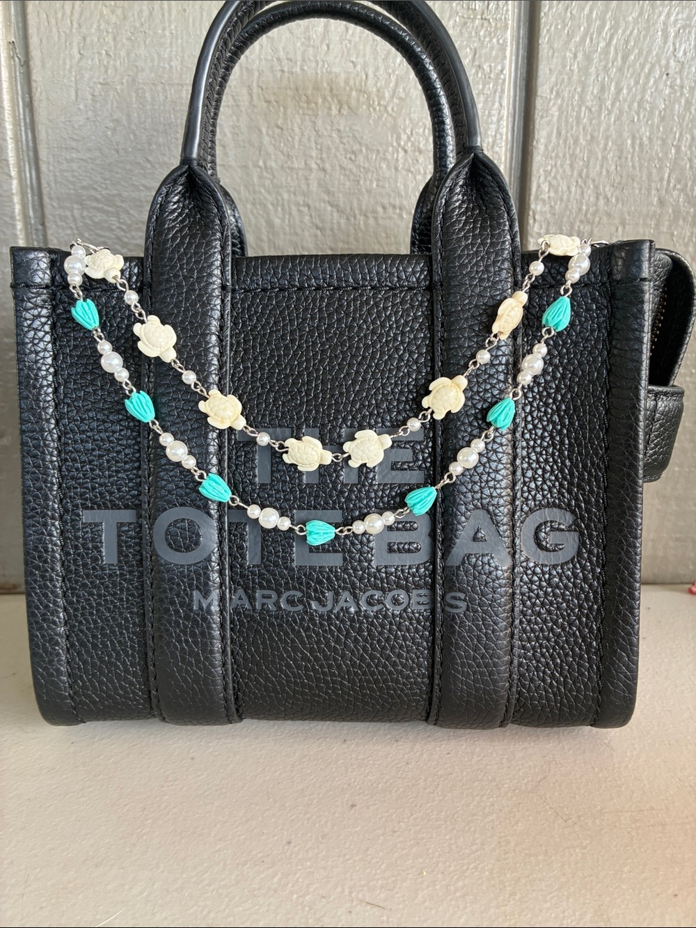 Turquoise Pikake and Cream Turtle Beaded Purse Lei